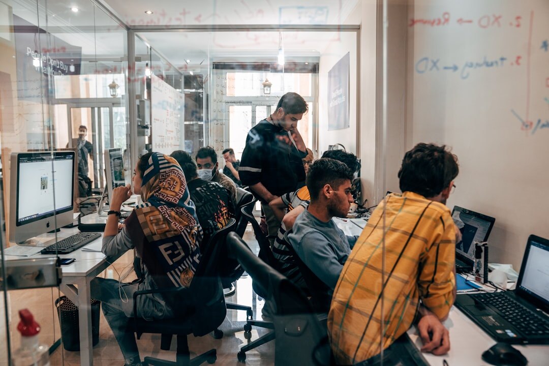 Diverse team of journalists working in a bright modern office